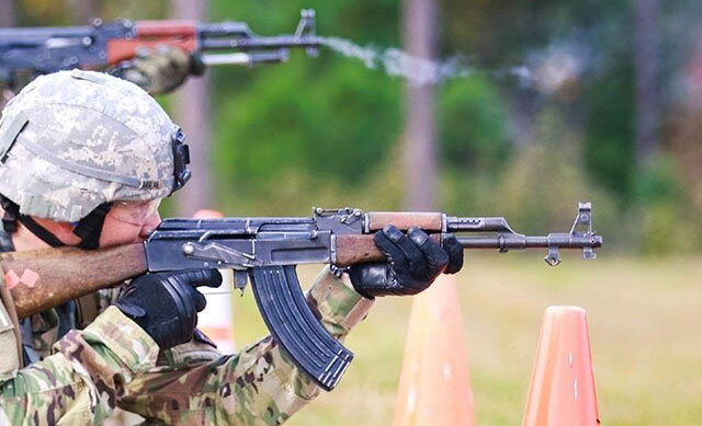 Soldiers firing AK-47s